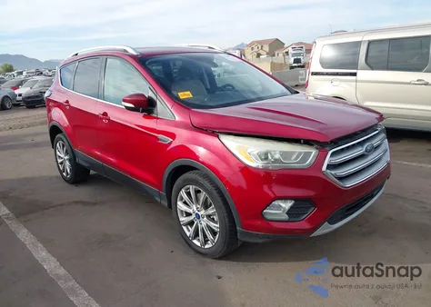 2017 Ford Escape Titanium z USA, uszkodzony, nr VIN 1FMCU9J96HUF08797